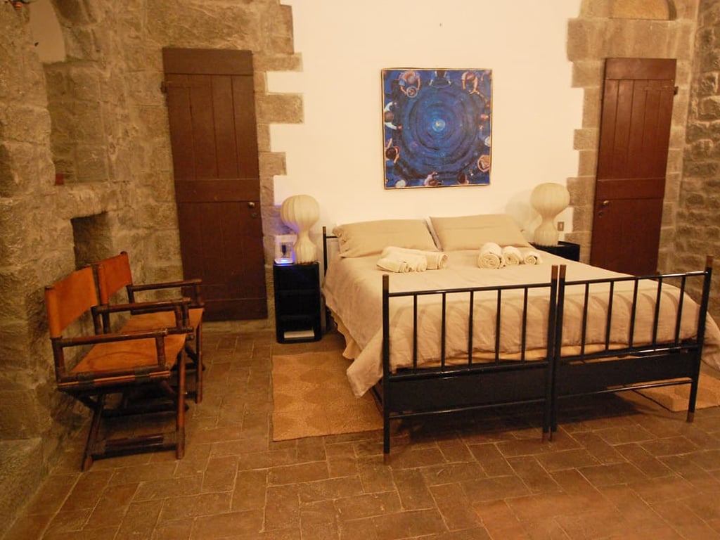 Torre del Merlo | Medieval Tower for 4 with a pool in the olive grove