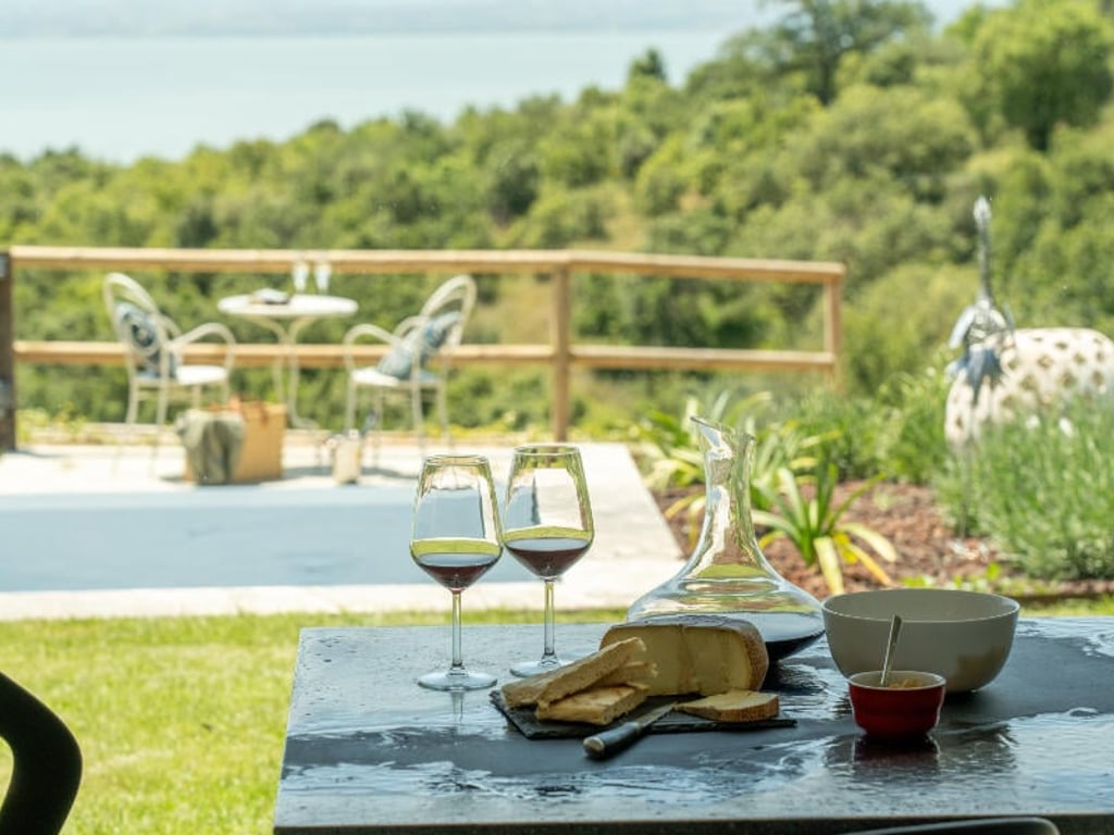 Villa Feronia | Luxury lakeside villa and pool, Passignano