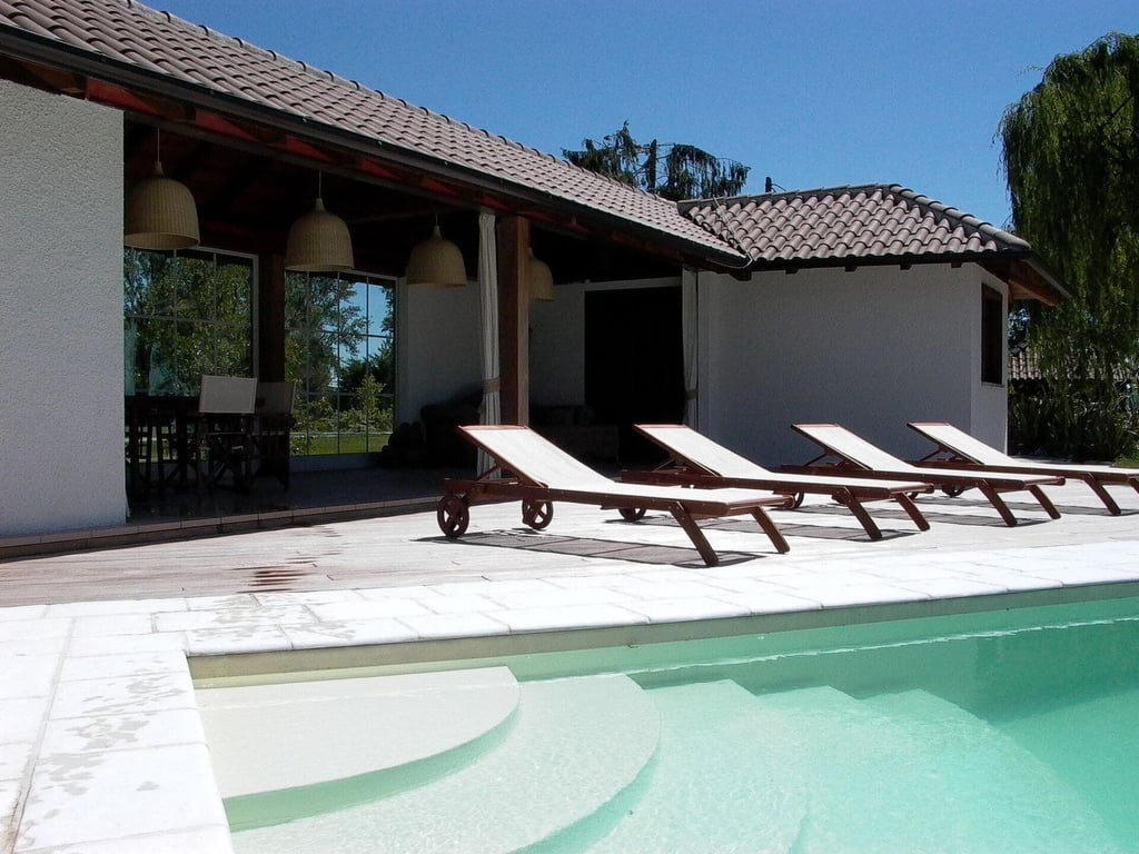 Erno | Luxury waterfront villa with a private beach and golf course
