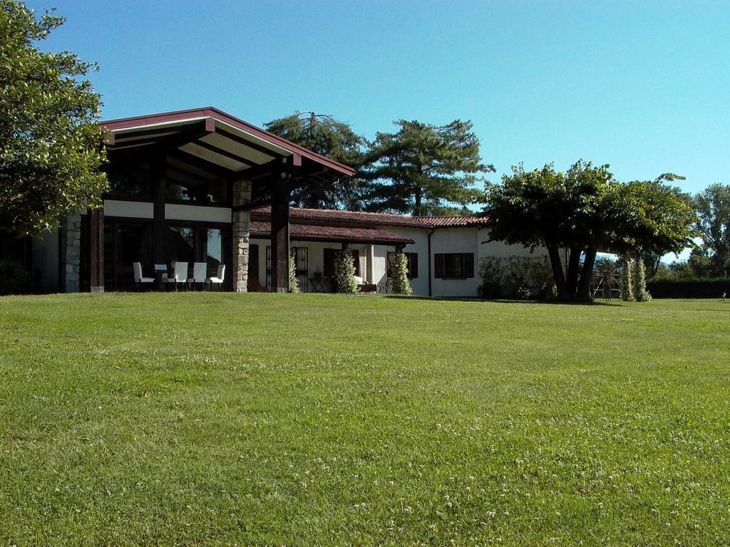 Erno | Luxury waterfront villa with a private beach and golf course