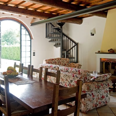 The upper floor is reached via a spiral staircase