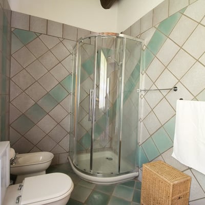 The shower room is shared between the two bedrooms