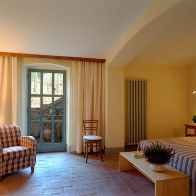 There are doors out onto the hamlet's grounds from the bedrooms