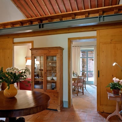 Sliding doors can separate the living area from the kitchen