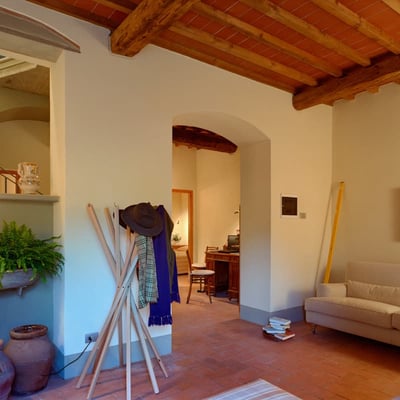 The ceilings are beamed in the classic Tuscan manner