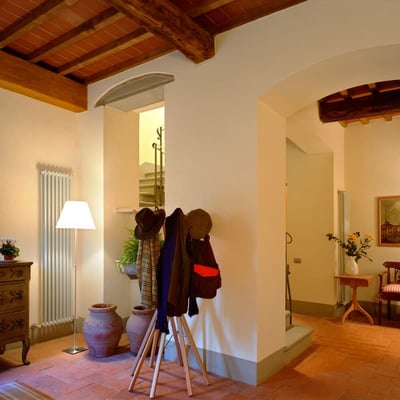 The ceilings are beamed in the classic Tuscan manner