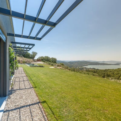 Villa Feronia | Luxury lakeside villa and pool, Passignano