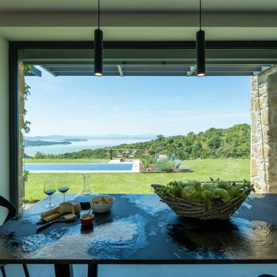 Villa Feronia | Luxury lakeside villa and pool, Passignano