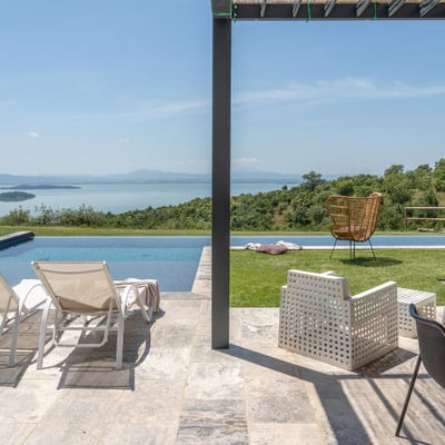 Villa Feronia | Luxury lakeside villa and pool, Passignano