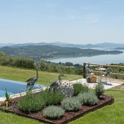 Villa Feronia | Luxury lakeside villa and pool, Passignano