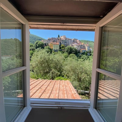 The local village of Ameglia framed in a window
