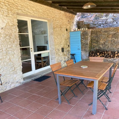 A shaded pergola outside the kitchen