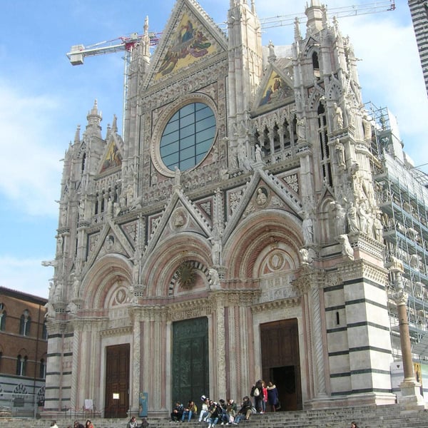 The medieval city of Siena with the Piazza del Campo and Duomo is under 30 mins drive