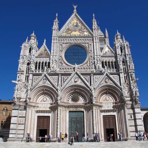 Siena with its famous shell-shaped piazza is an hour's drive