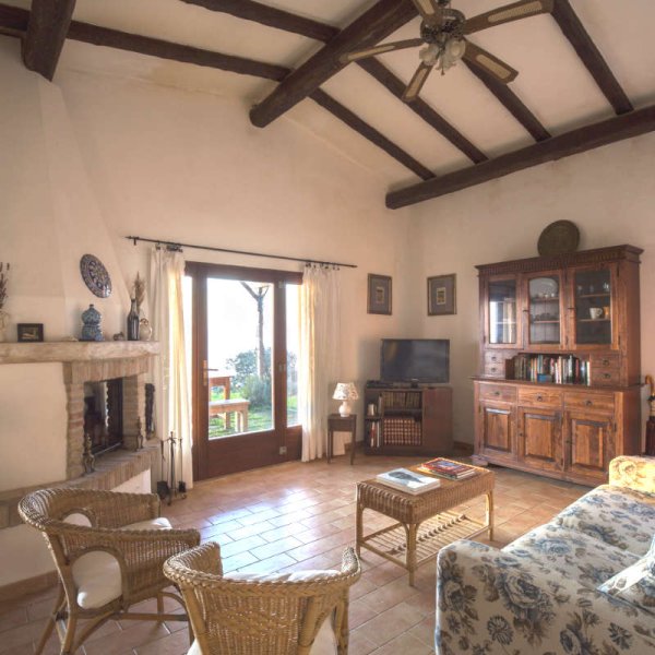 The main room of the house is both living room and kitchen, with a fireplace for off-season stays